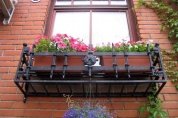 Кованая подставка для цветов №145 в Екатеринбурге фото